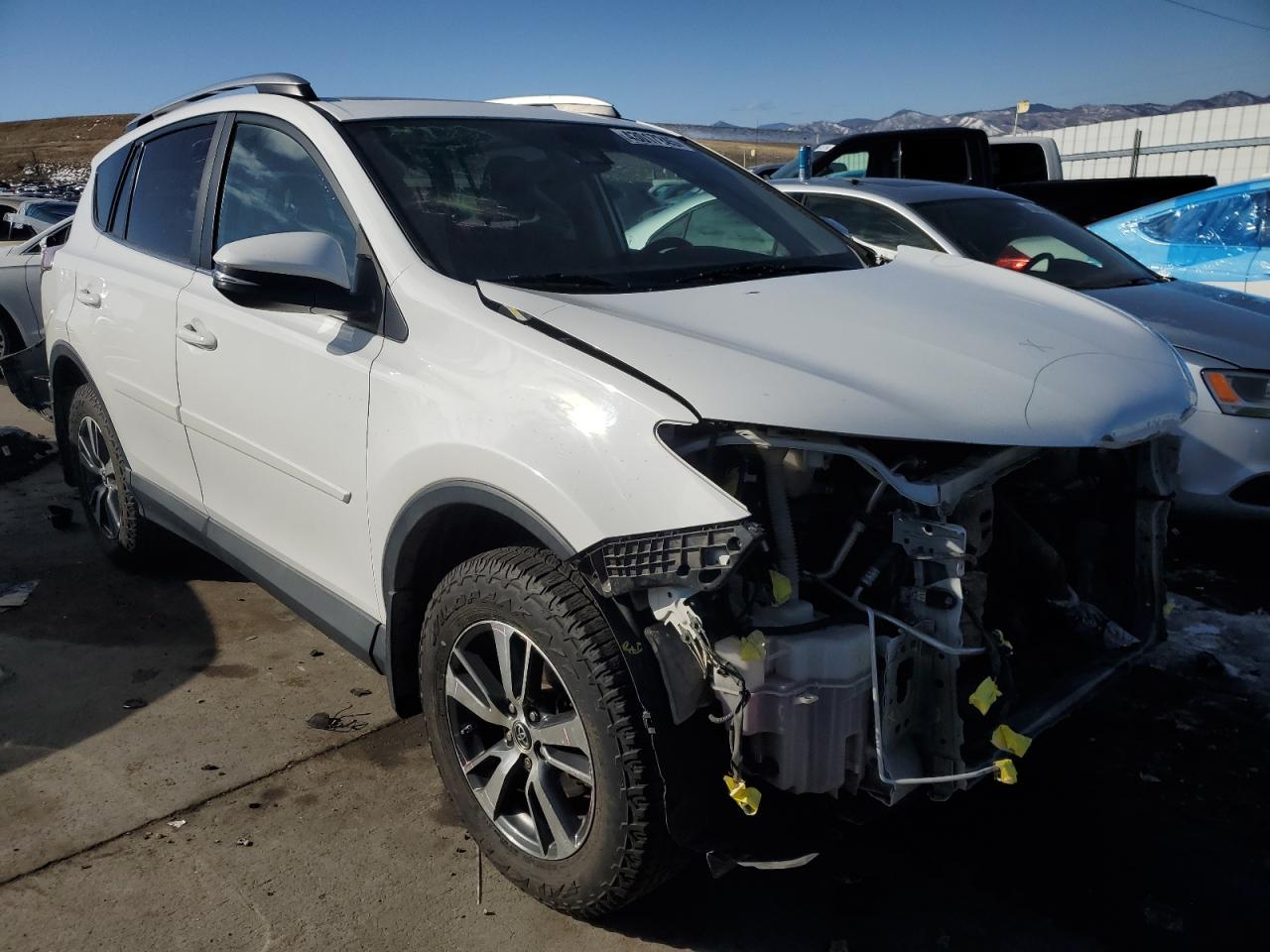 2018 Toyota RAV 4 VIN 2T3RFREV8JW744229 Copart auction photo, front end / minor dent/scratches damage thumbnail 4