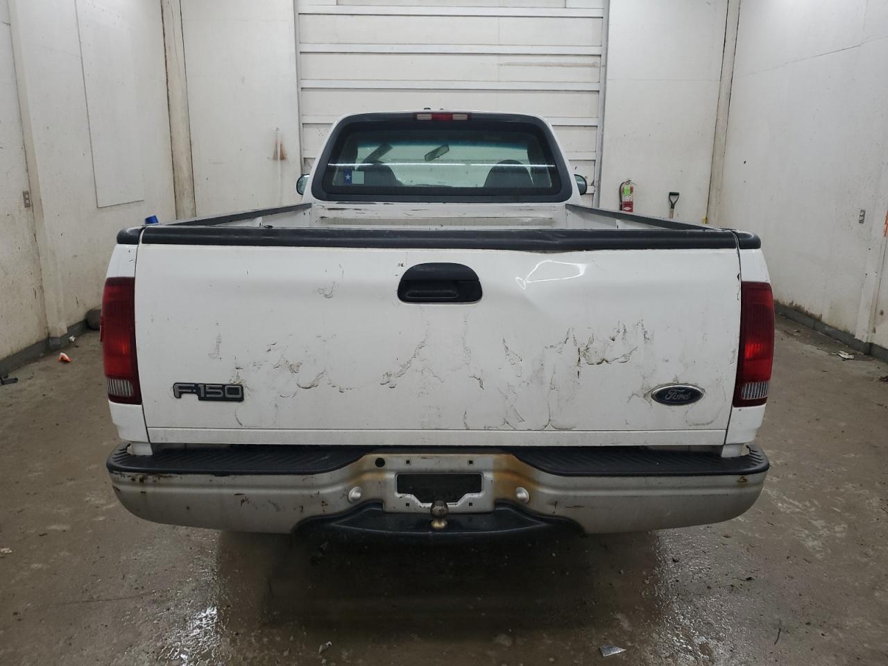 2000 Ford F-150 VIN 1FTRF17L7YNB52822 Copart auction photo, front end / side damage thumbnail 6