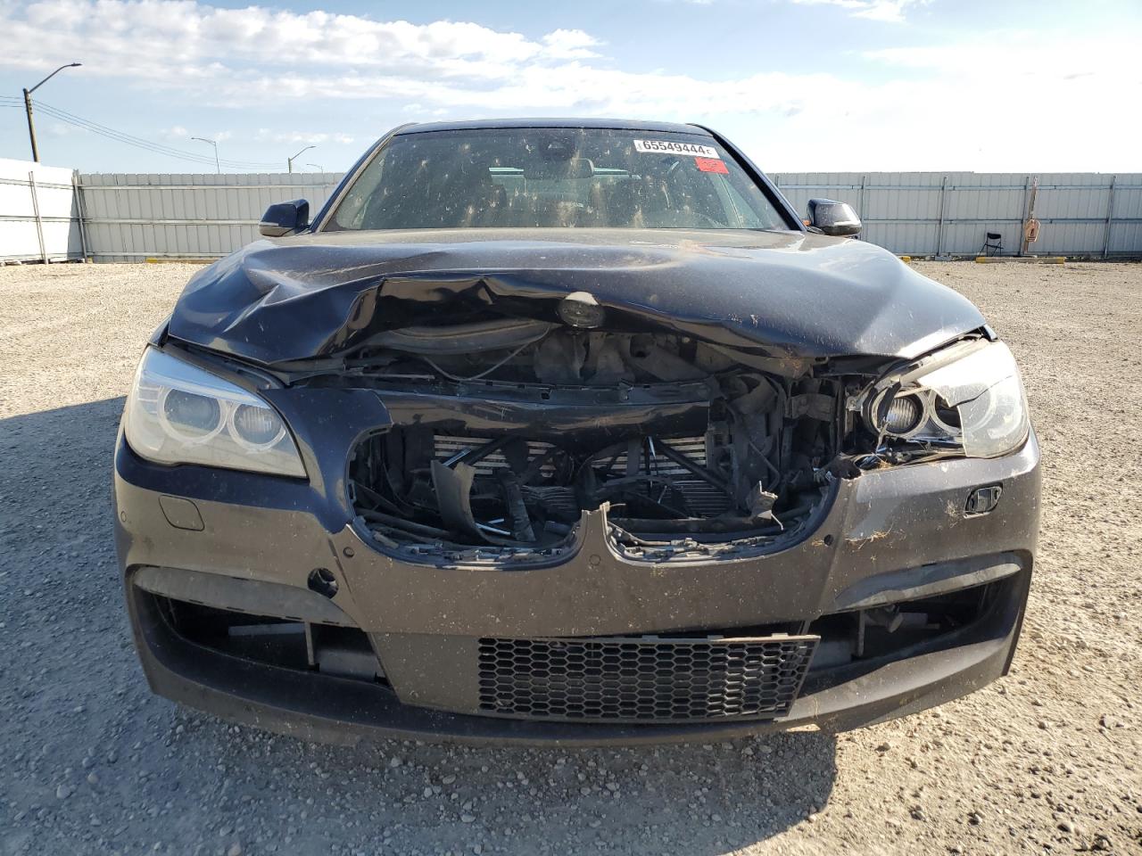 2013 BMW 7er VIN WBAYF8C52DD140828 Copart auction photo, front end / minor dent/scratches damage thumbnail 5