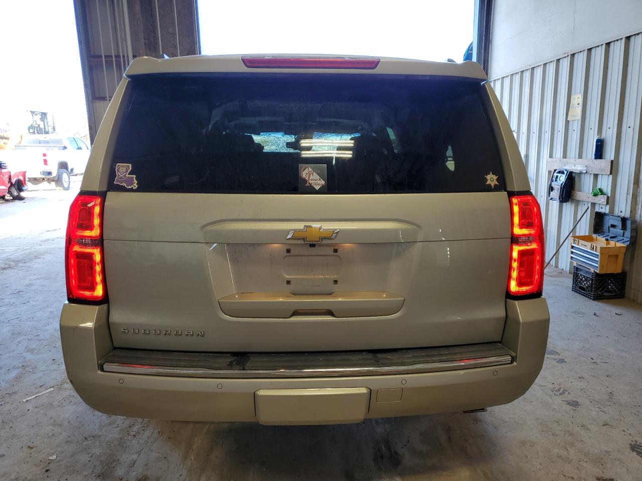 2015 Chevrolet Suburban VIN 1GNSCKKC9FR238394 Copart auction photo, front end / hail damage thumbnail 6
