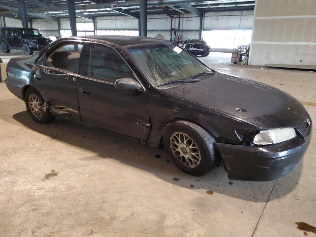 1999 Toyota Camry VIN 4T1BG22K4XU469430 Copart auction photo, side / front end damage thumbnail 4
