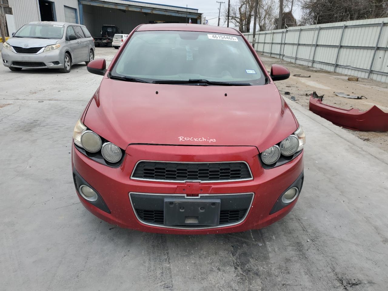 2012 Chevrolet Sonic VIN 1G1JC5SH3C4152159 Copart auction photo, rear end / minor dent/scratches damage thumbnail 5