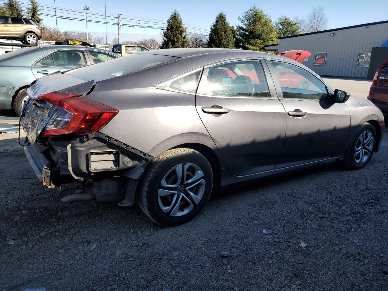 2018 Honda Civic VIN 19XFC2F57JE206036 Copart auction photo, rear end / minor dent/scratches damage thumbnail 3