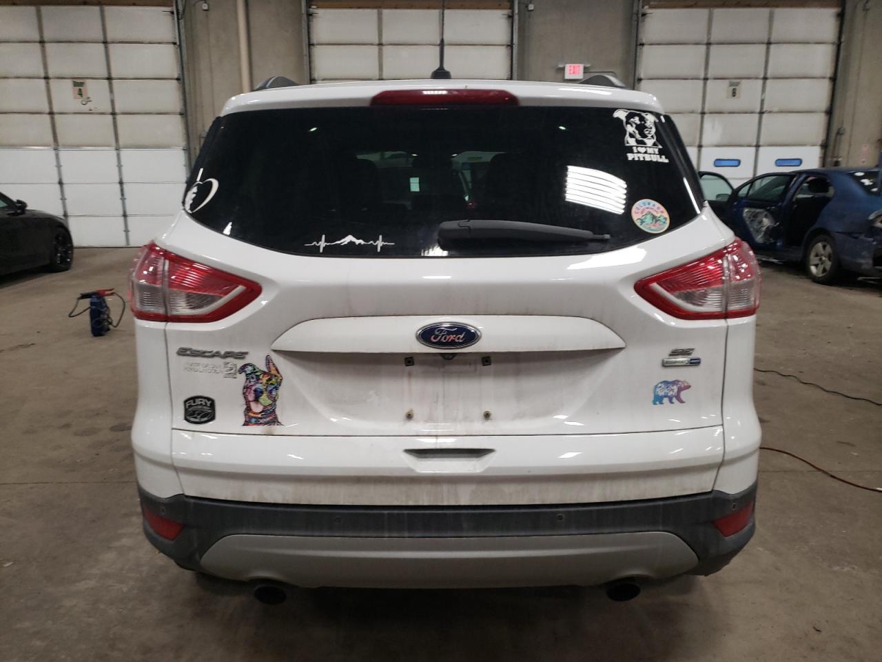 2016 Ford Escape VIN 1FMCU9GX8GUC66423 Copart auction photo, all over damage thumbnail 6