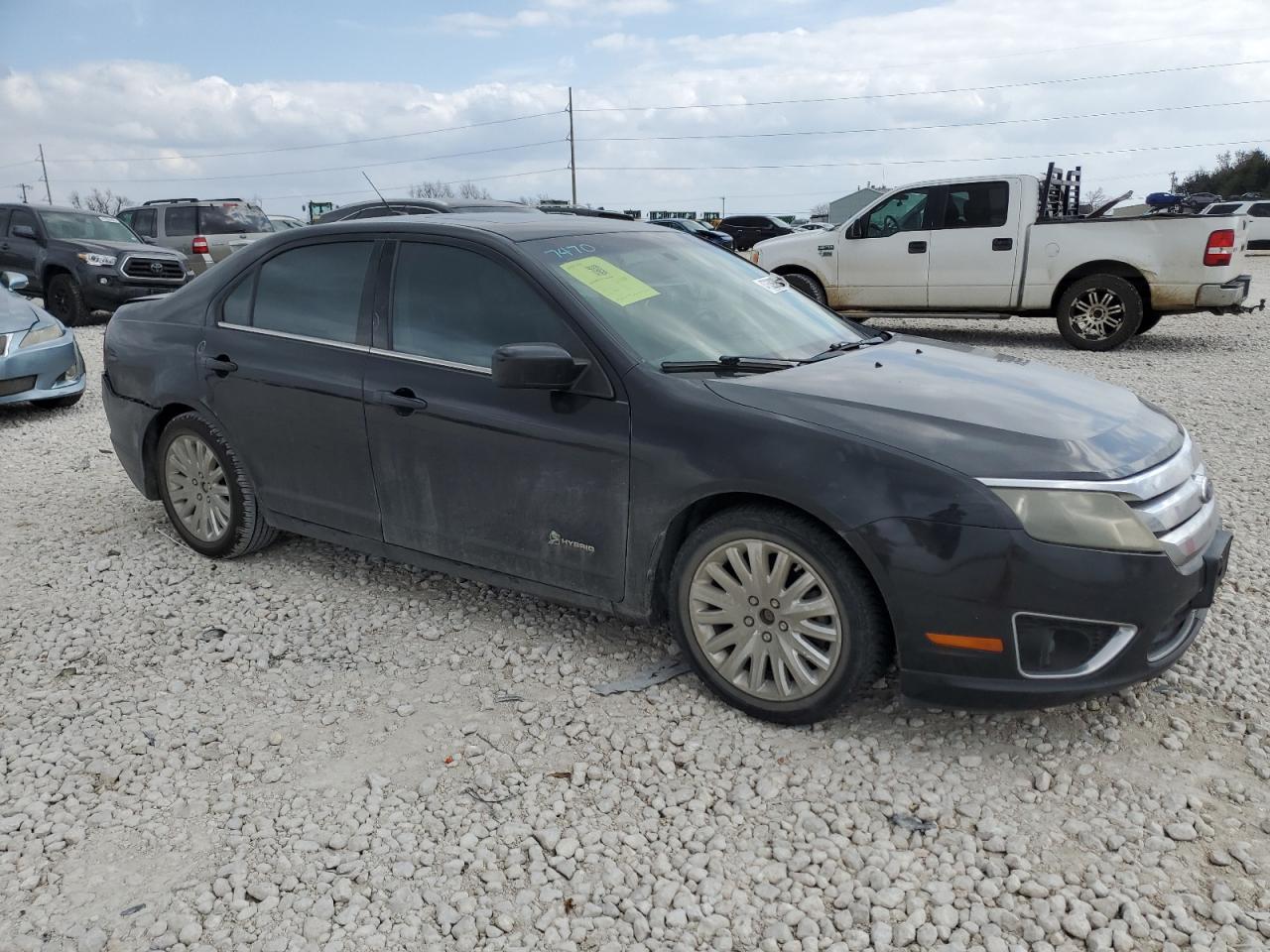 2010 Ford Fusion VIN 3FADP0L3XAR184972 Copart auction photo, rear end / minor dent/scratches damage thumbnail 4