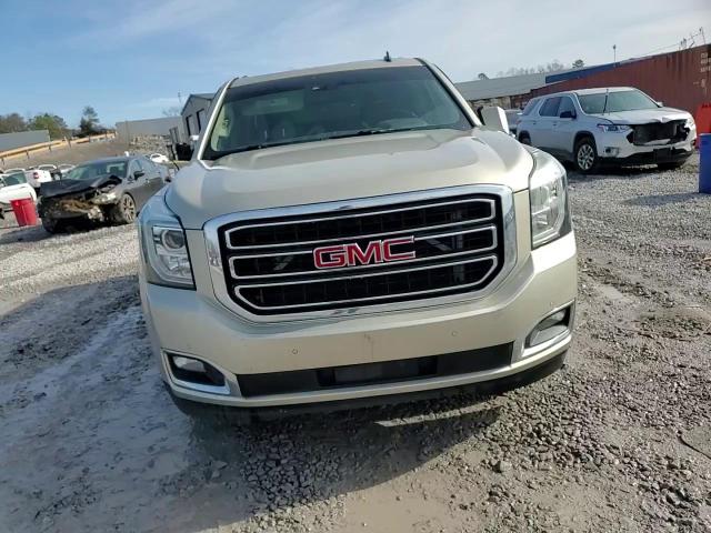2015 GMC Yukon VIN 1GKS1BKC0FR132550 Copart auction photo, side damage thumbnail 14