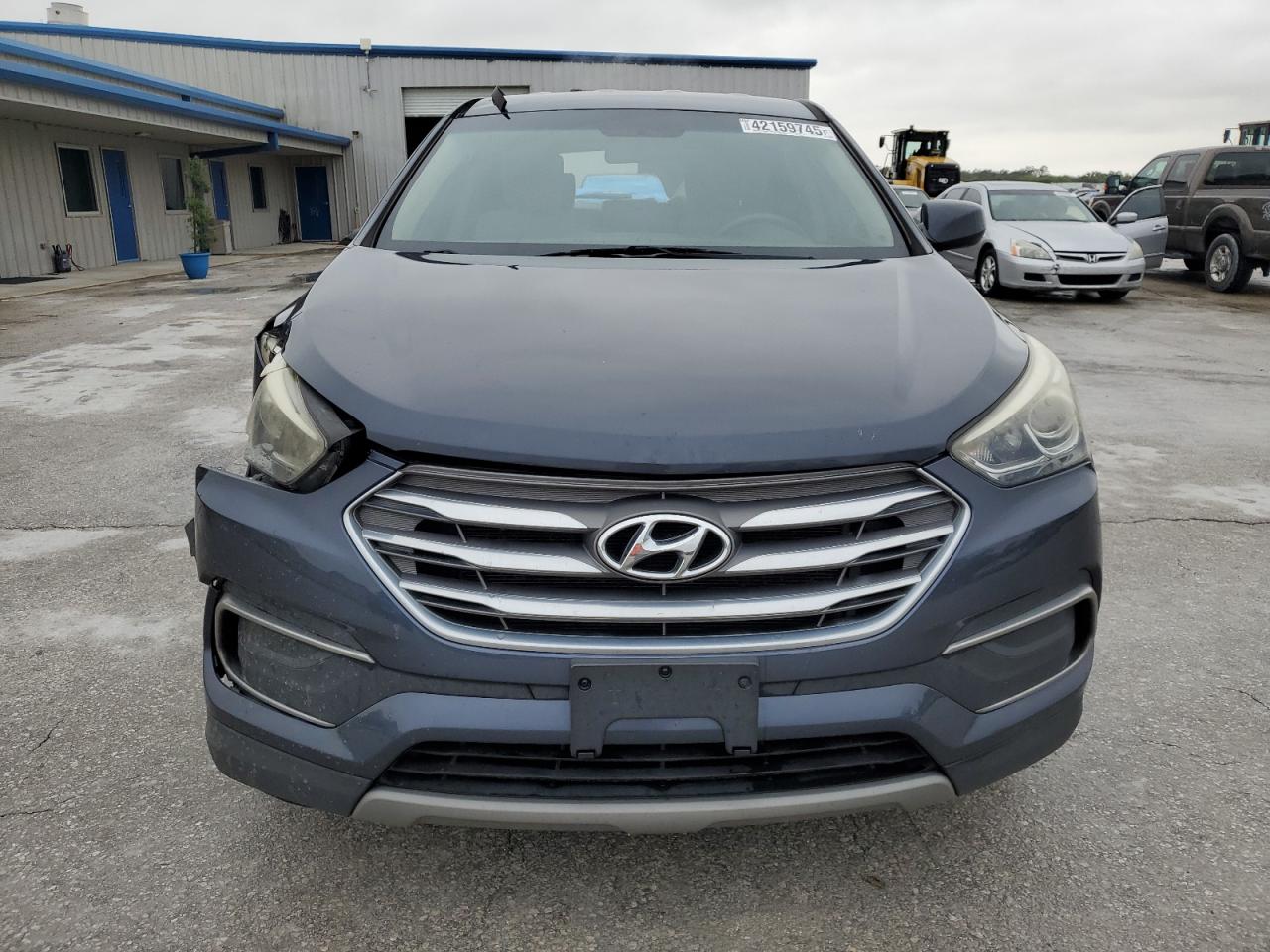 2018 Hyundai Santa Fe VIN 5NMZT3LB2JH082098 Copart auction photo, side / minor dent/scratches damage thumbnail 5