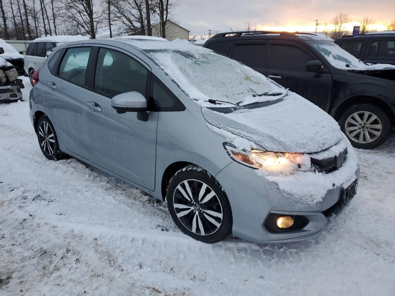 2018 Honda Fit VIN 3HGGK5H88JM718525 Copart auction photo, side / front end damage thumbnail 4