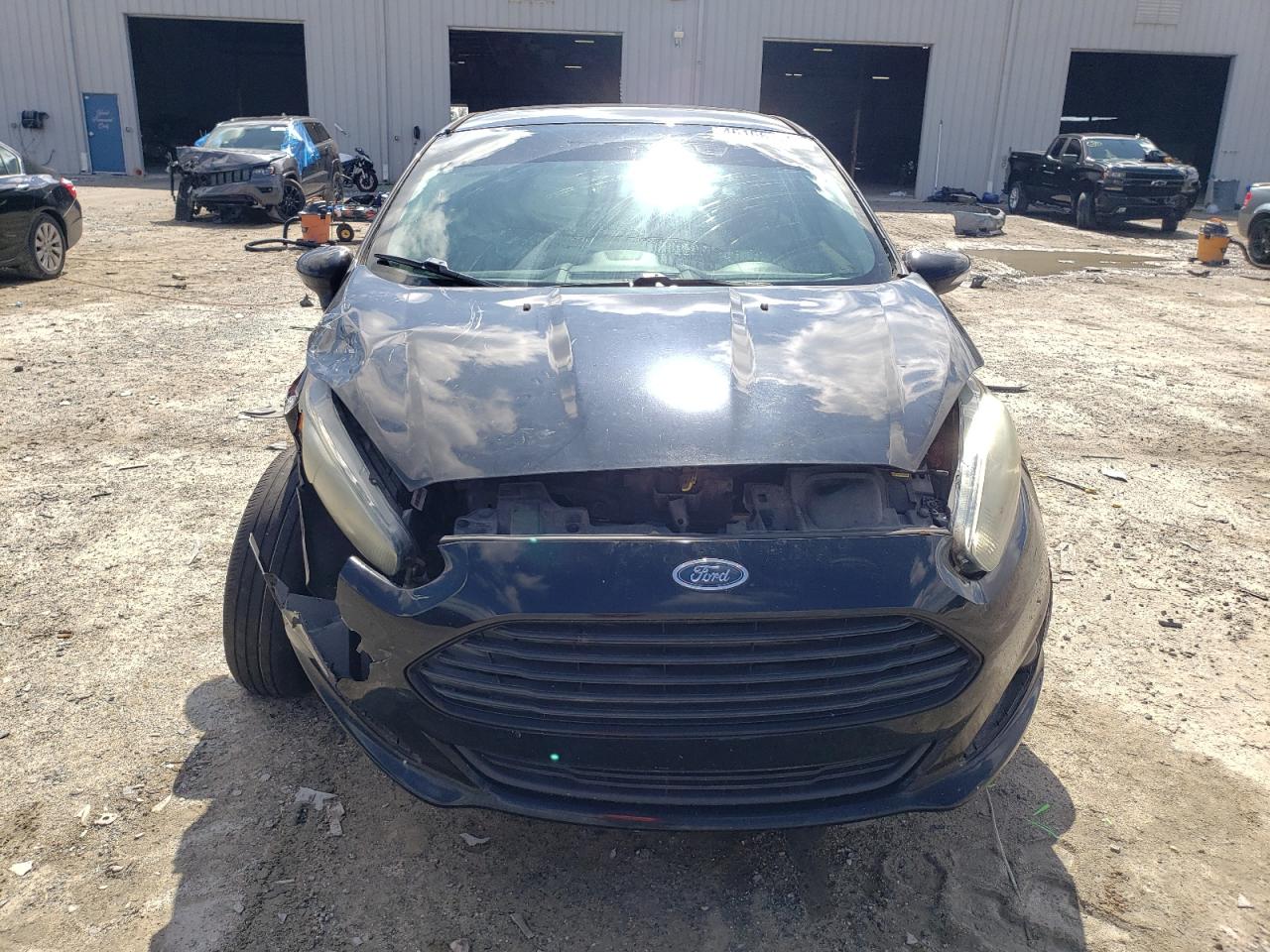 2016 Ford Fiesta VIN 3FADP4EJXGM142469 Copart auction photo, front end damage thumbnail 5