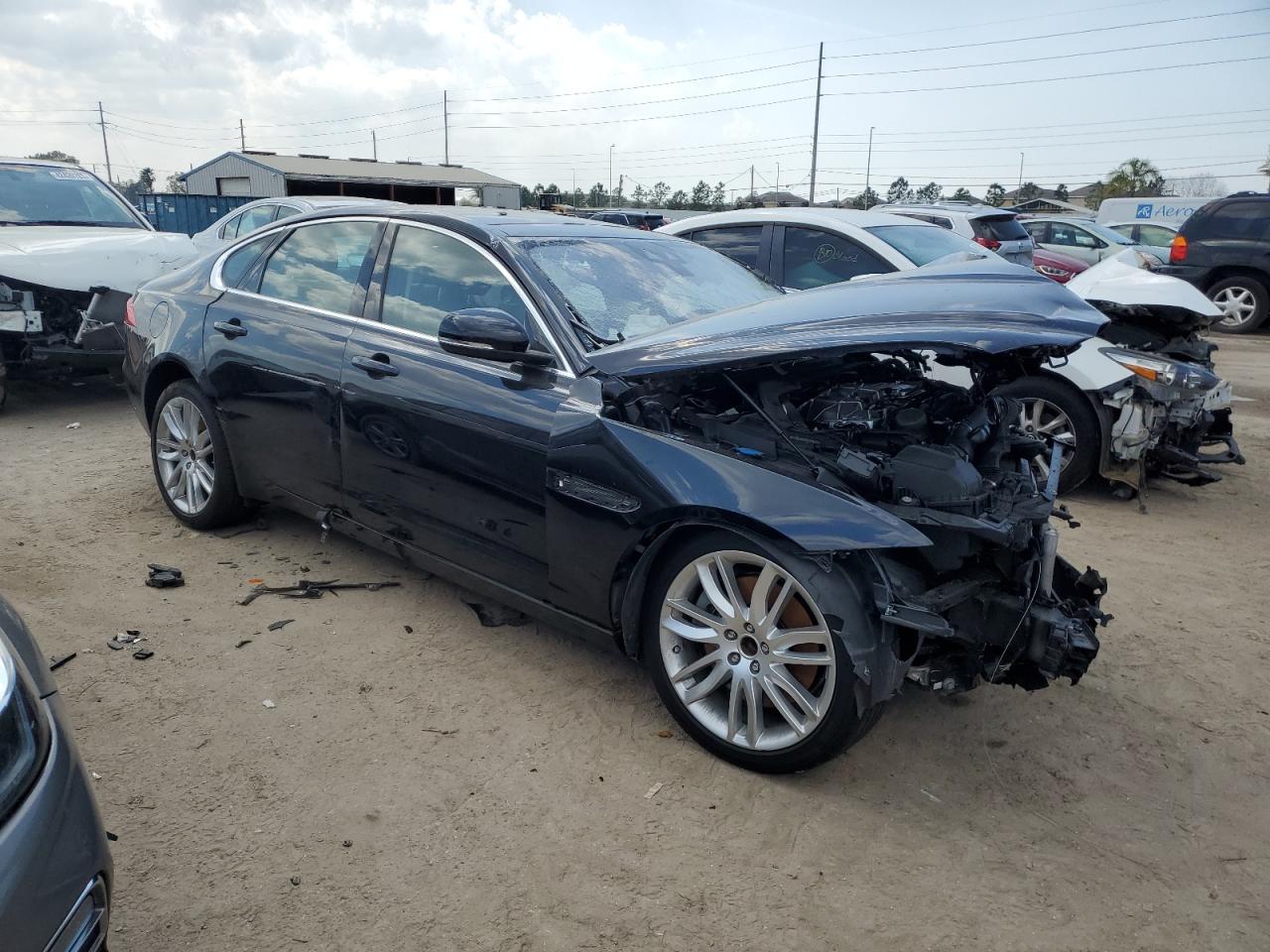 2016 Jaguar XF VIN SAJBE4BV0GCY09695 Copart auction photo, front end / side damage thumbnail 4