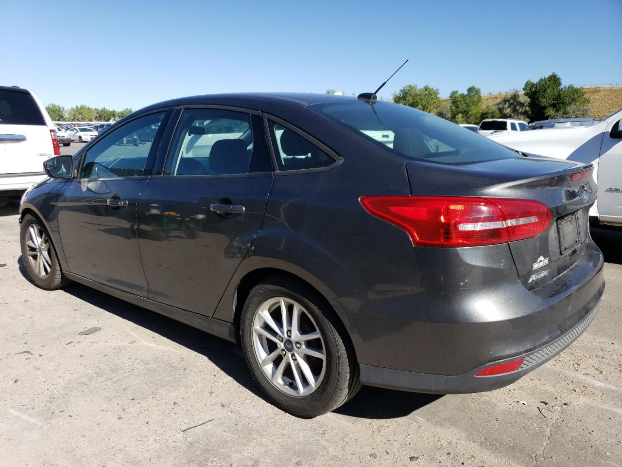 2016 Ford Focus VIN 1FADP3F26GL297782 Copart auction photo, front end / hail damage thumbnail 2