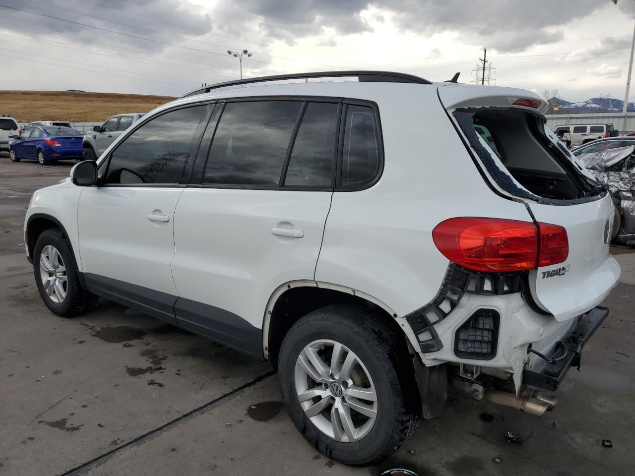2016 Volkswagen Tiguan VIN WVGBV7AX8GW579725 Copart auction photo, rear end damage thumbnail 2