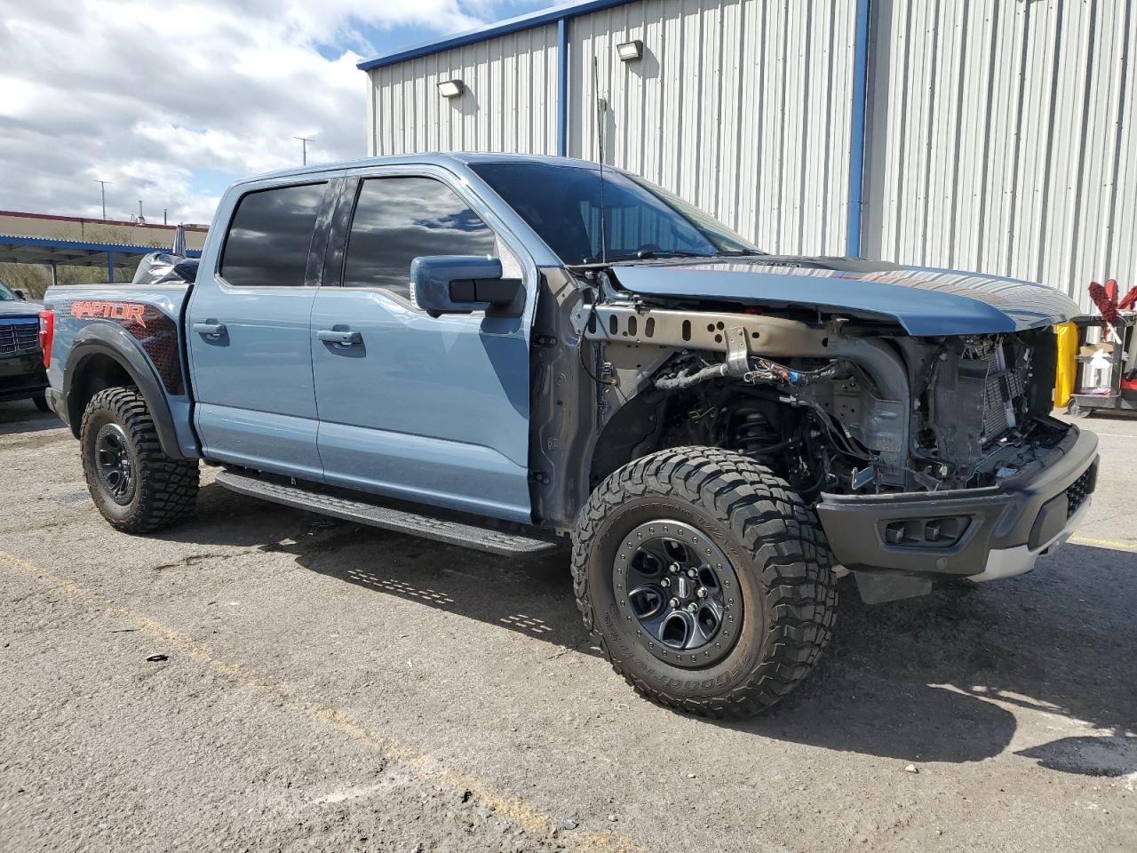 2023 Ford F-150 VIN 1FTFW1RG2PFD16974 Copart auction photo, front end damage thumbnail 4