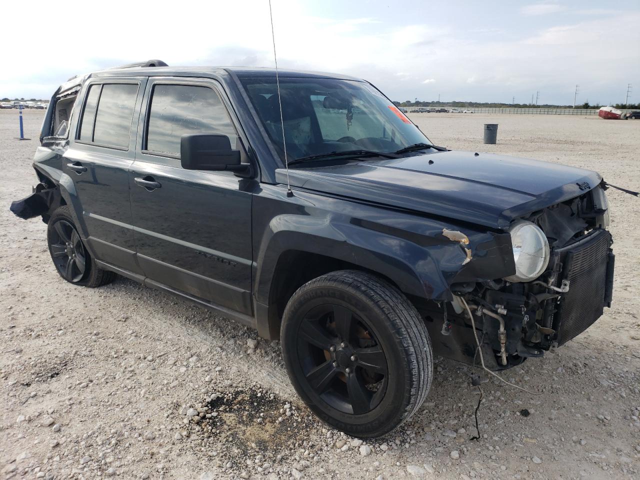 2015 Jeep Liberty (Patriot) VIN 1C4NJPBAXFD281131 Copart auction photo, all over damage thumbnail 4