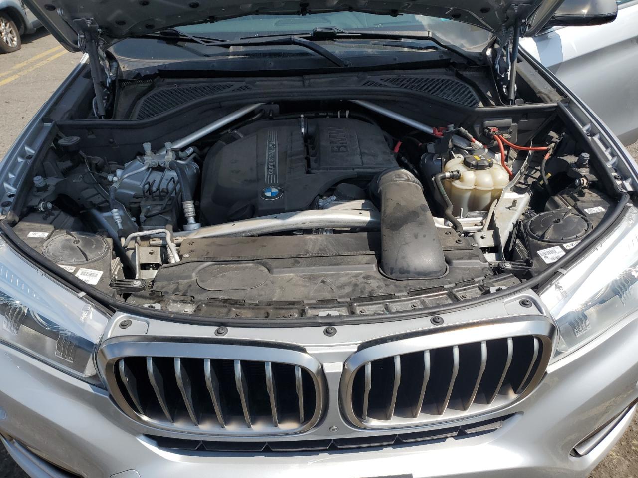 2019 BMW X6 VIN 5UXKU0C57K0S97385 Copart auction photo, side / front end damage thumbnail 12