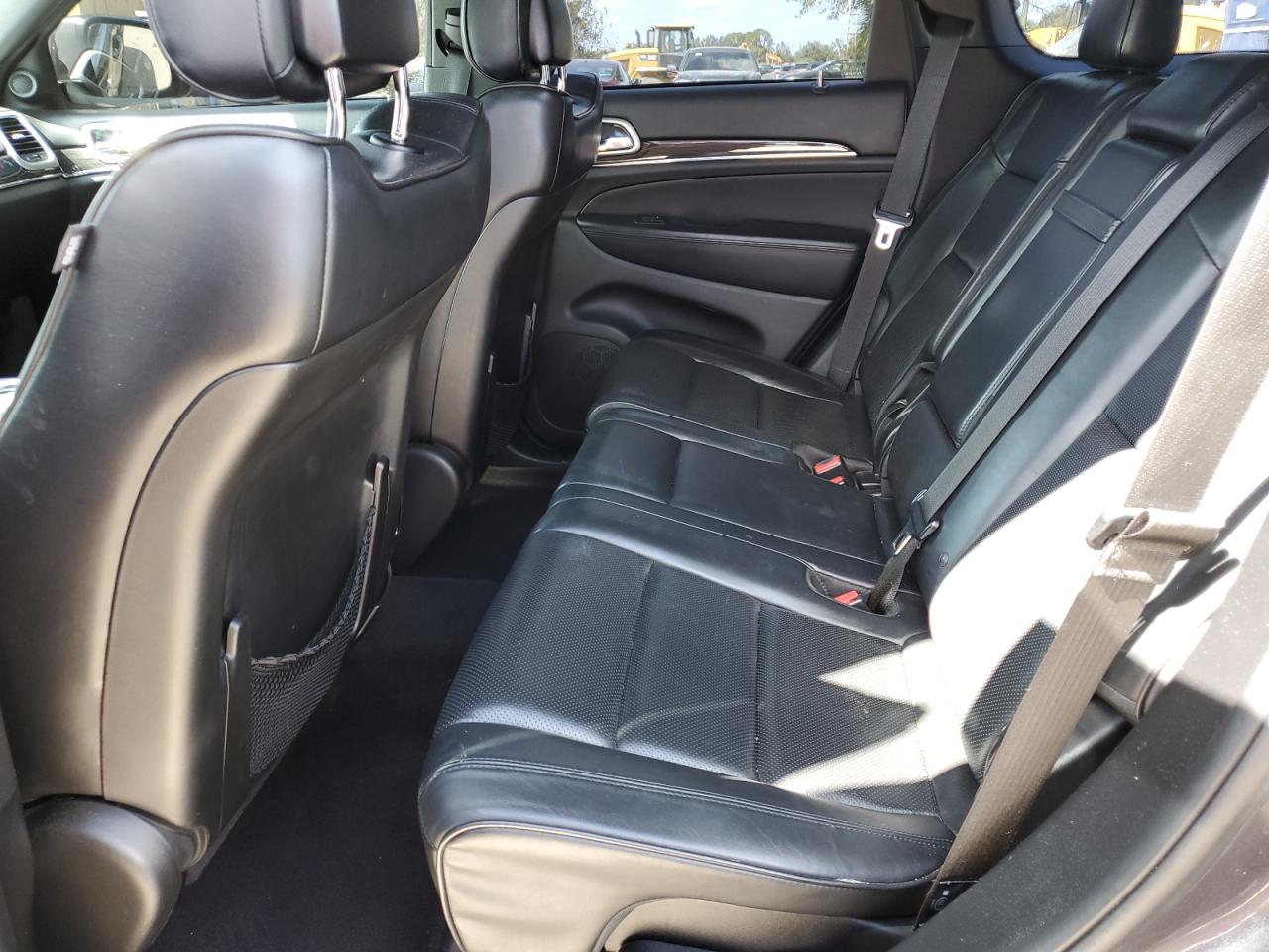 2015 Jeep Grand Cherokee VIN 1C4RJECG8FC192995 Copart auction photo, side / all over damage thumbnail 11