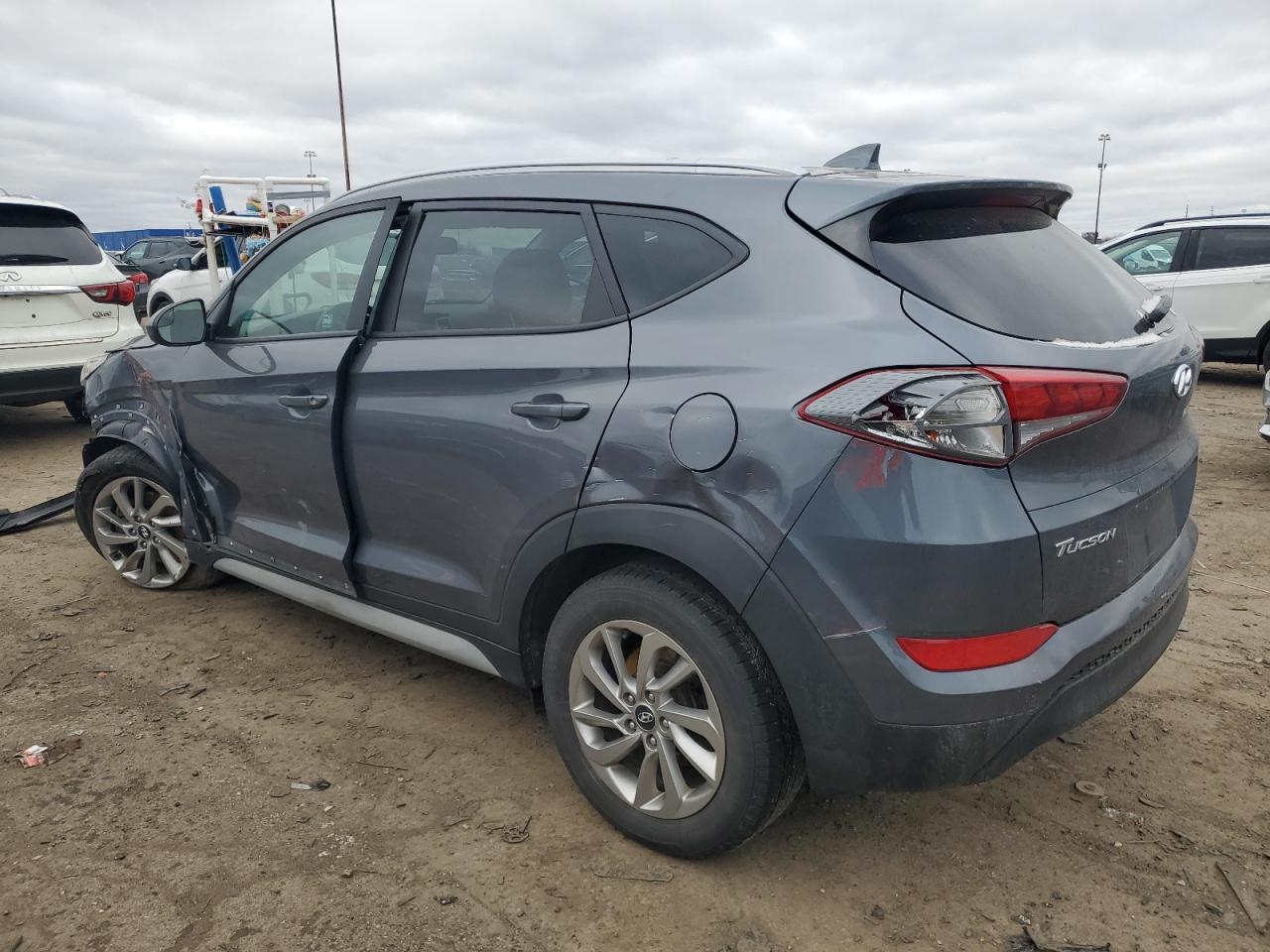 2018 Hyundai Tucson VIN KM8J3CA47JU748992 Copart auction photo, side / front end damage thumbnail 2