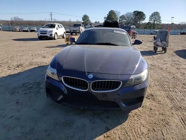 2011 BMW Z4 VIN WBALM5C56BE378638 Copart auction photo, all over damage thumbnail 11