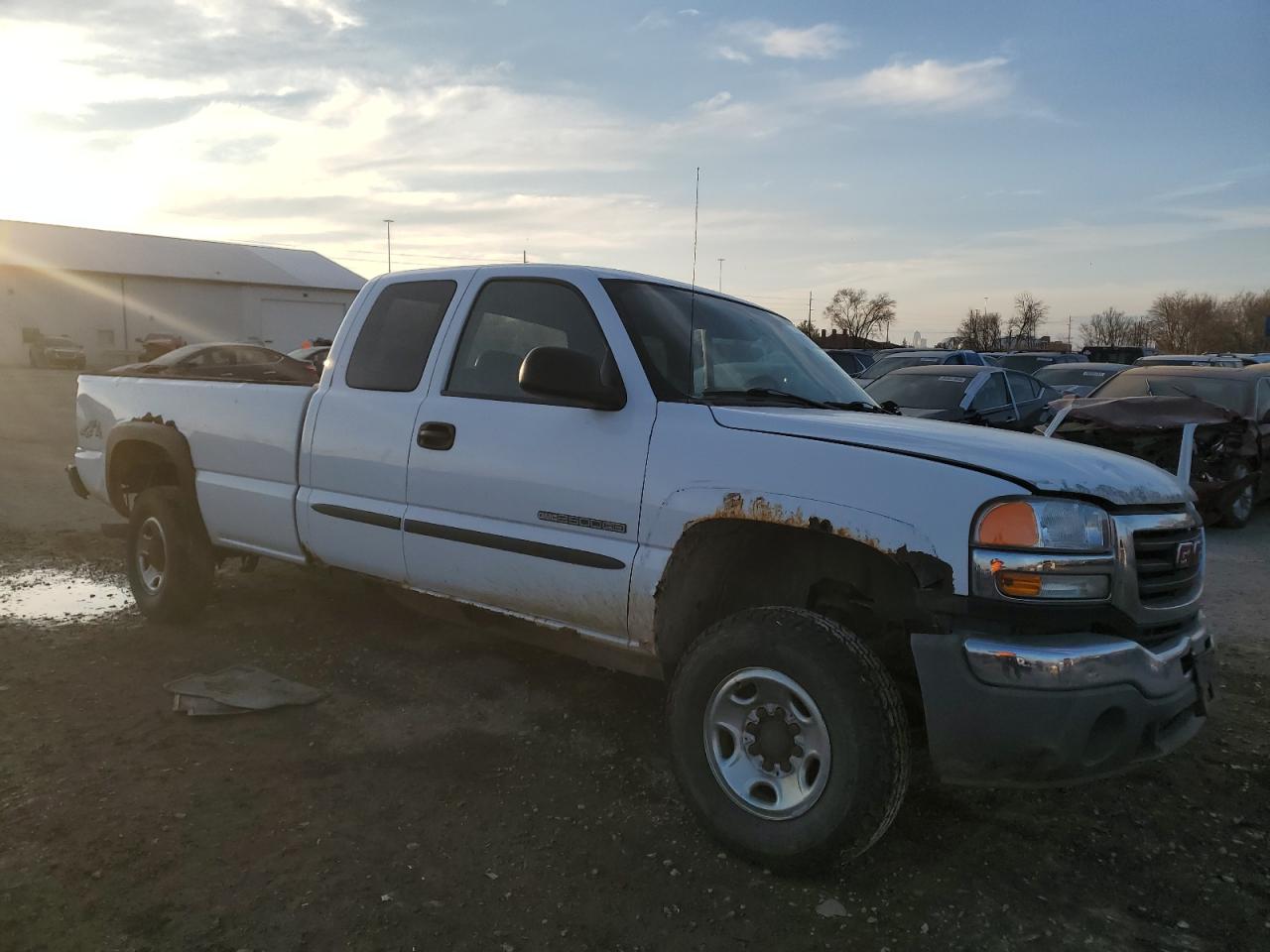 2006 GMC Sierra VIN 1GTHK29U66E165027 Copart auction photo, side / rear end damage thumbnail 4