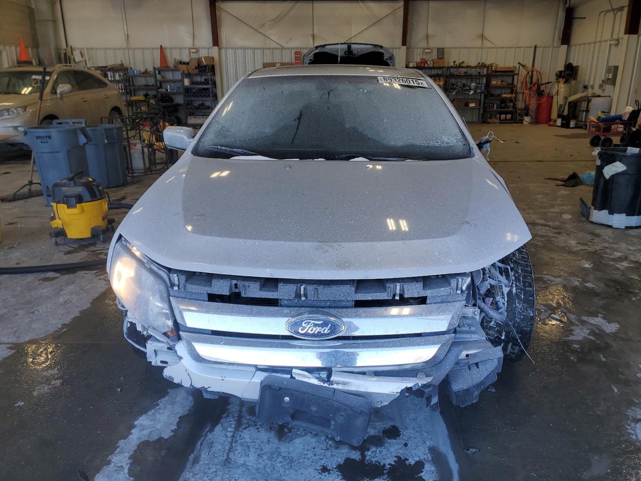 2012 Ford Fusion VIN 3FAHP0JA7CR338432 Copart auction photo, all over / front end damage thumbnail 5