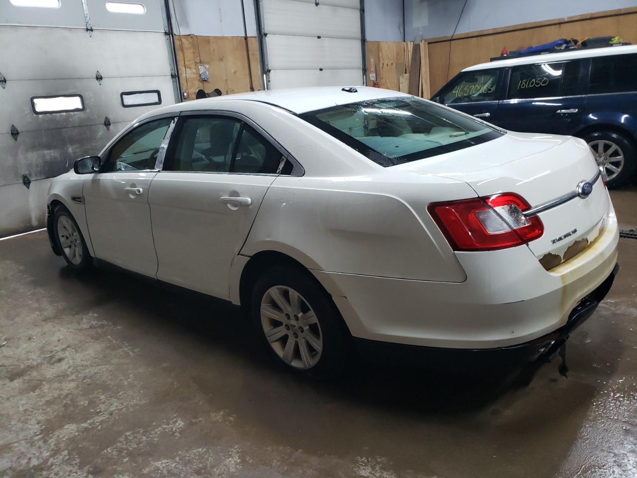 2011 Ford Taurus VIN 1FAHP2DW1BG185698 Copart auction photo, rear end / minor dent/scratches damage thumbnail 2