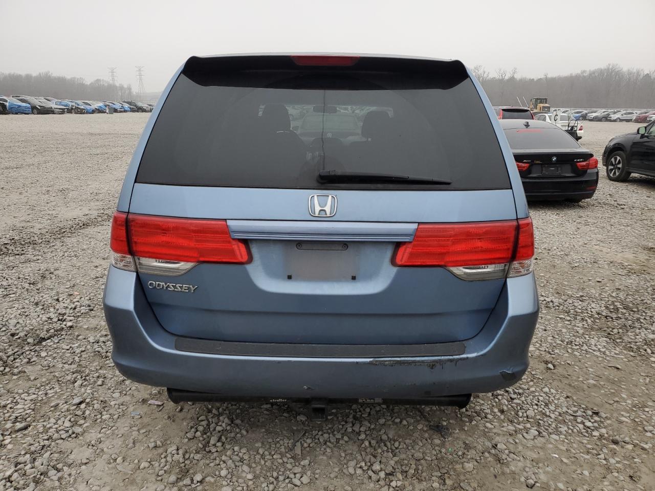 2010 Honda Odyssey VIN 5FNRL3H2XAB054639 Copart auction photo, front end / all over damage thumbnail 6