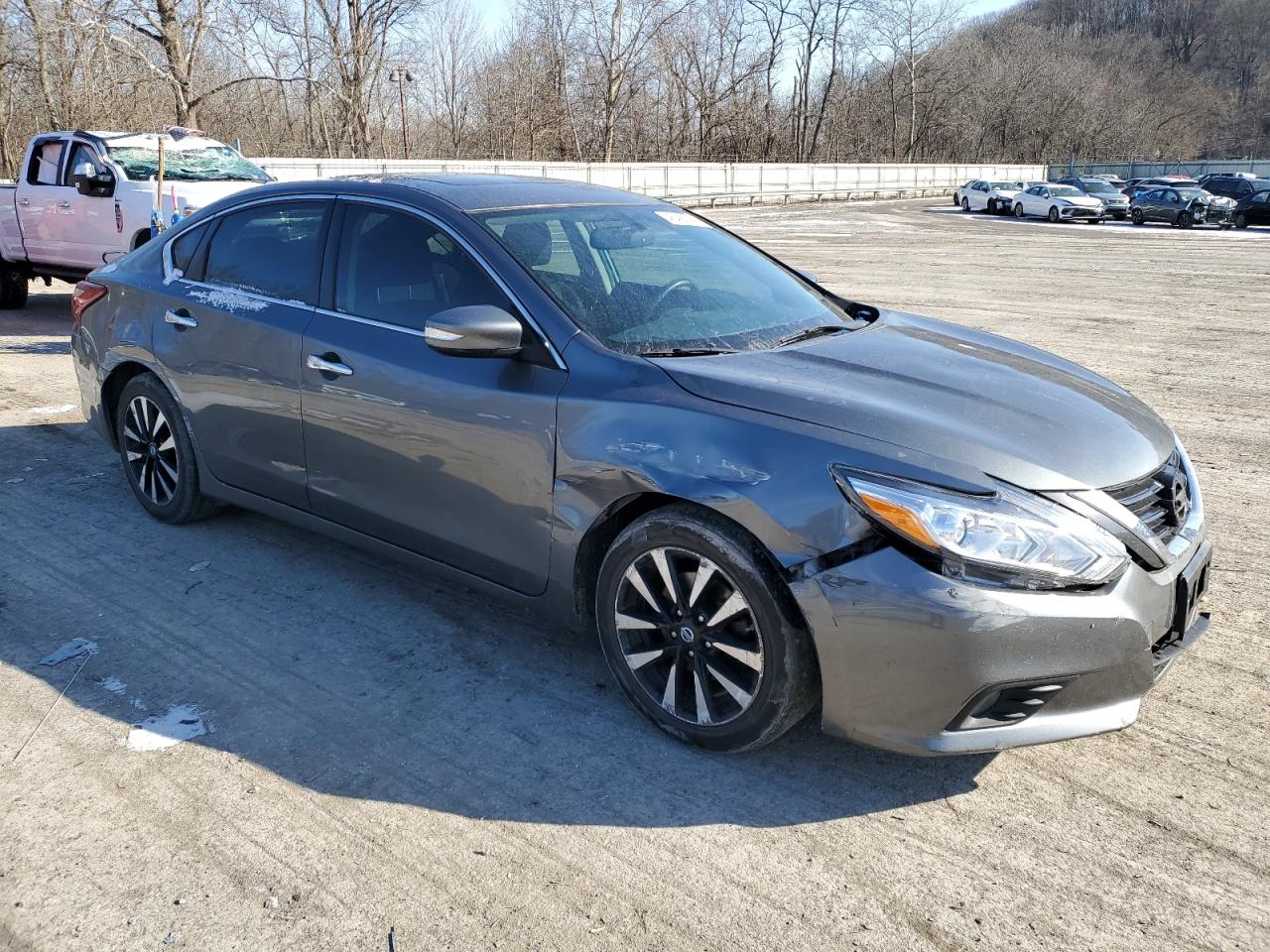 2018 Nissan Altima VIN 1N4AL3AP2JC156409 Copart auction photo, front end / side damage thumbnail 4