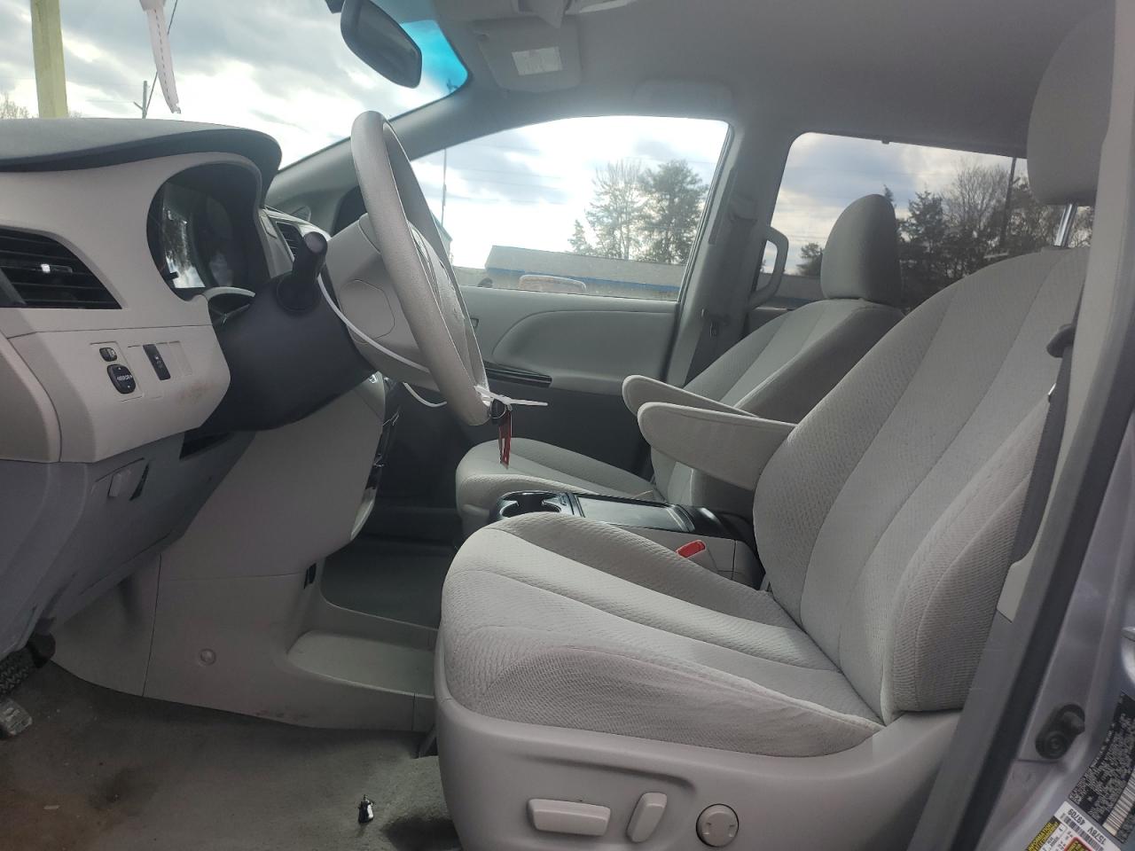 2012 Toyota Sienna VIN 5TDKK3DC5CS261229 Copart auction photo, all over damage thumbnail 7