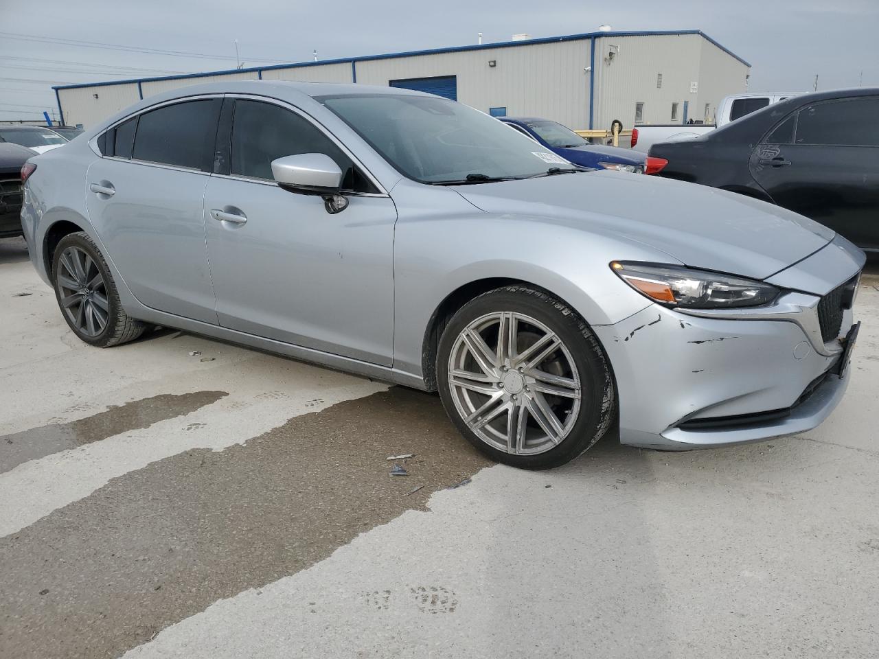 2018 Mazda 6 VIN JM1GL1VM6J1318904 Copart auction photo, side damage thumbnail 4