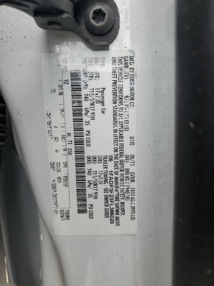 2015 Ford Focus VIN 1FADP3F23FL386028 Copart auction photo, all over damage thumbnail 12