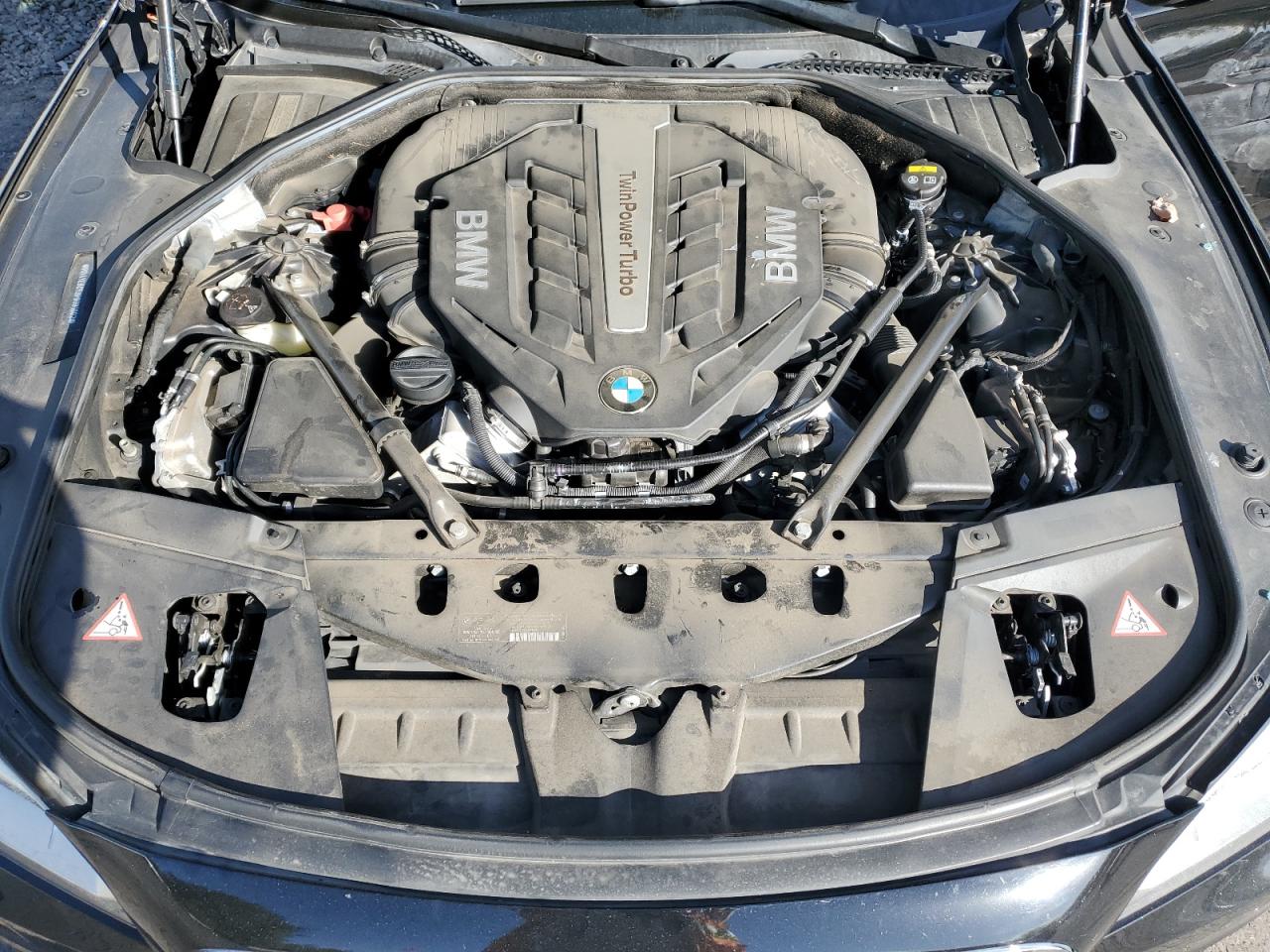 2015 BMW 7er VIN WBAYE8C53FD781802 Copart auction photo, all over / undercarriage damage thumbnail 11