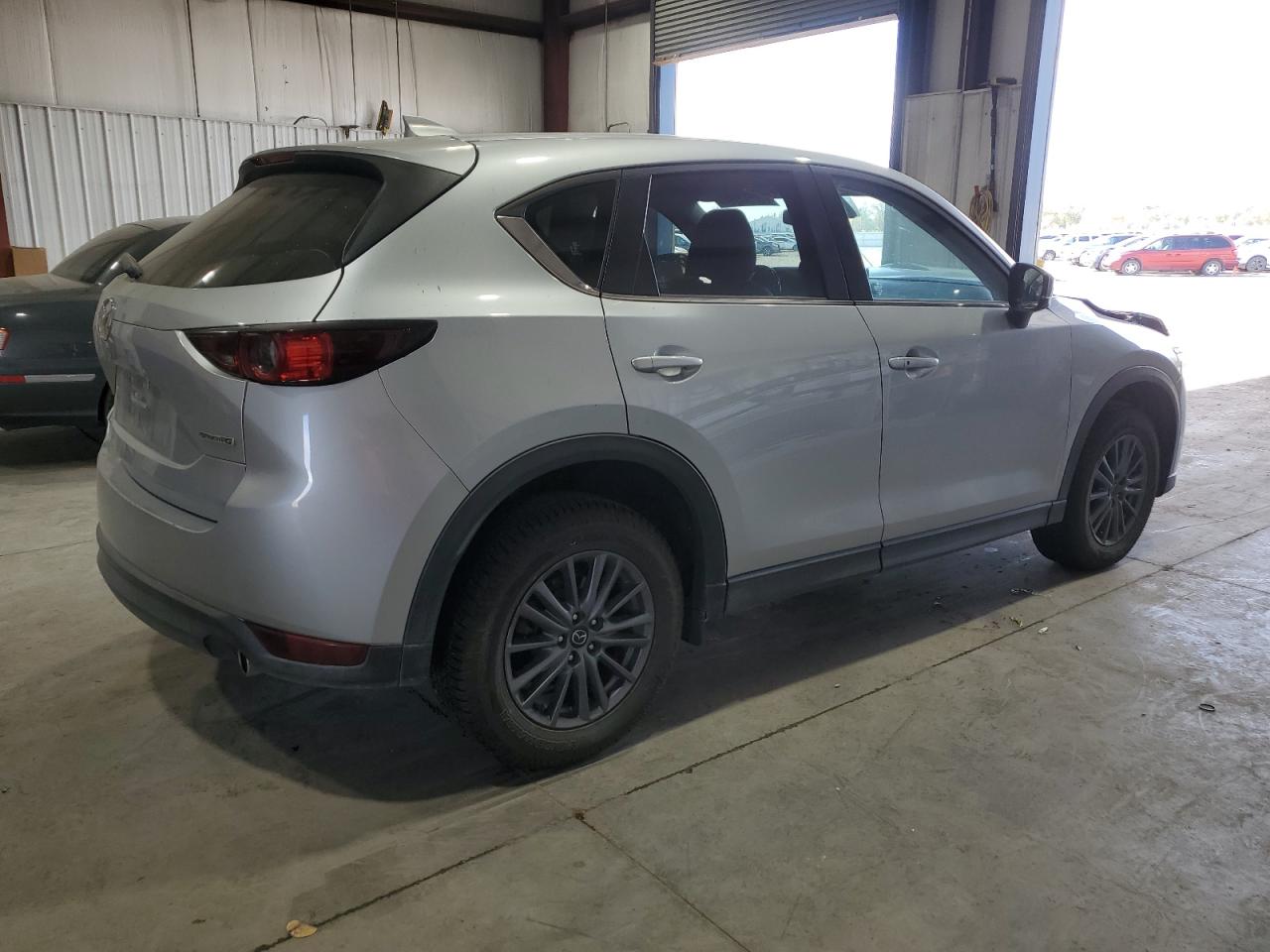 2021 Mazda CX-5 VIN JM3KFBCM8M0359093 Copart auction photo, front end / side damage thumbnail 3
