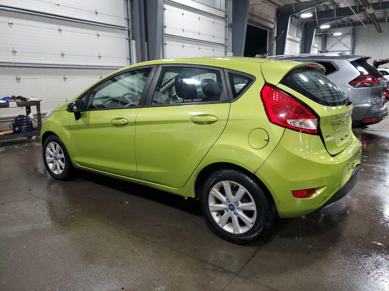 2012 Ford Fiesta VIN 3FADP4EJ3CM170768 Copart auction photo, rear end damage thumbnail 2