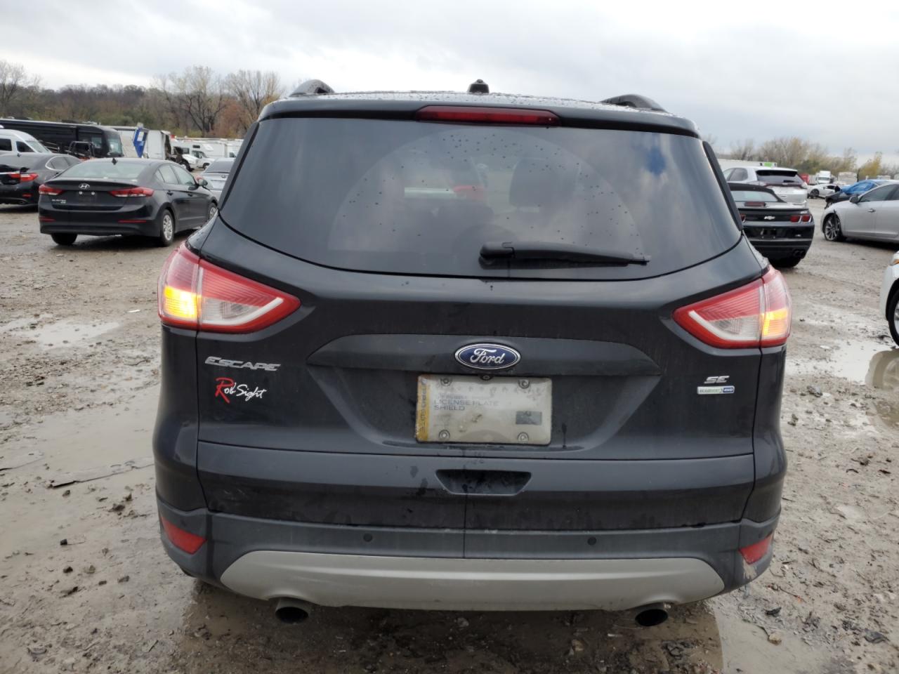 2015 Ford Escape VIN 1FMCU9GX6FUB27986 Copart auction photo, vandalism / minor dent/scratches damage thumbnail 6