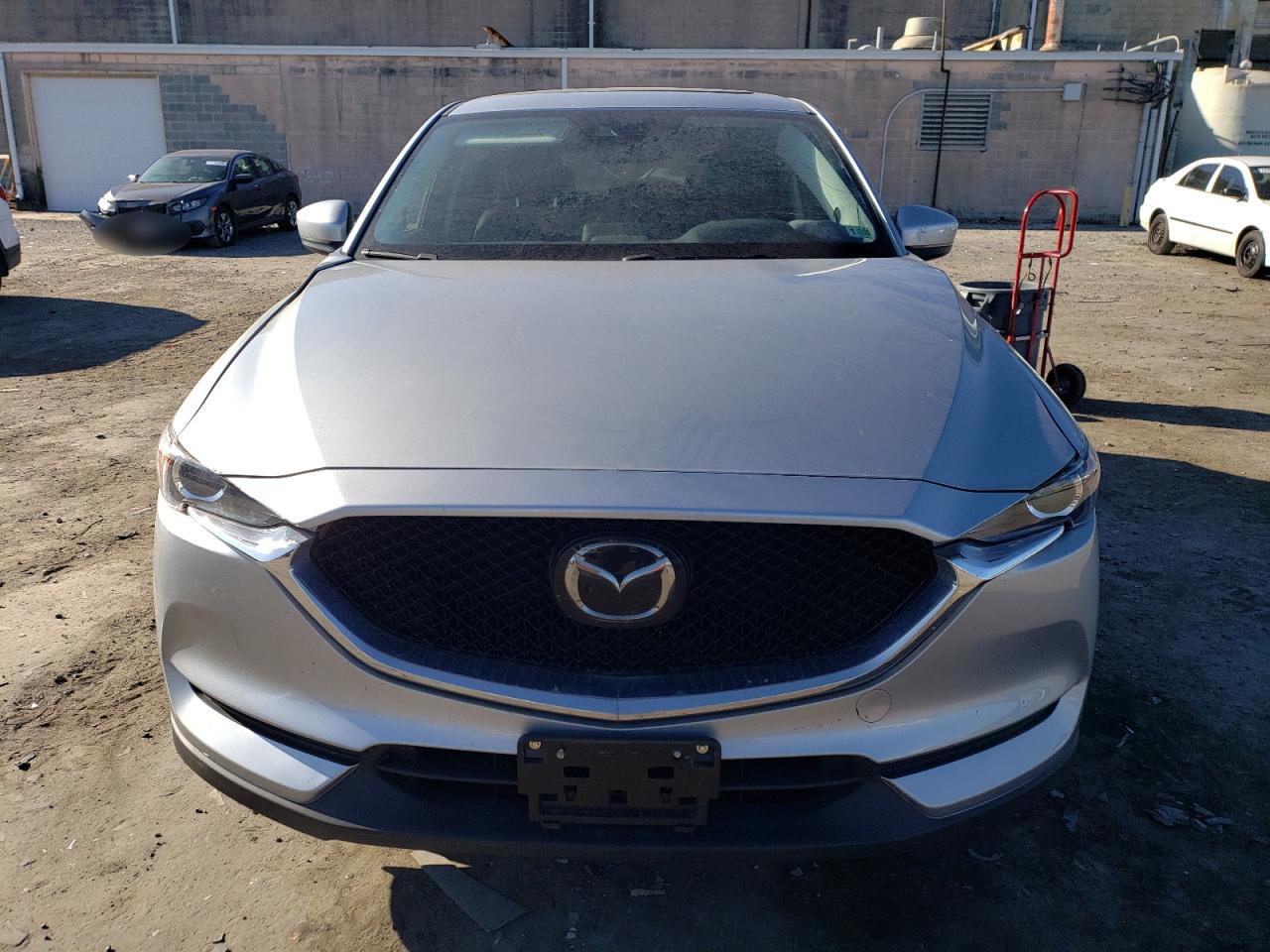 2019 Mazda CX-5 VIN JM3KFBCM5K0667173 Copart auction photo, side / rear end damage thumbnail 5
