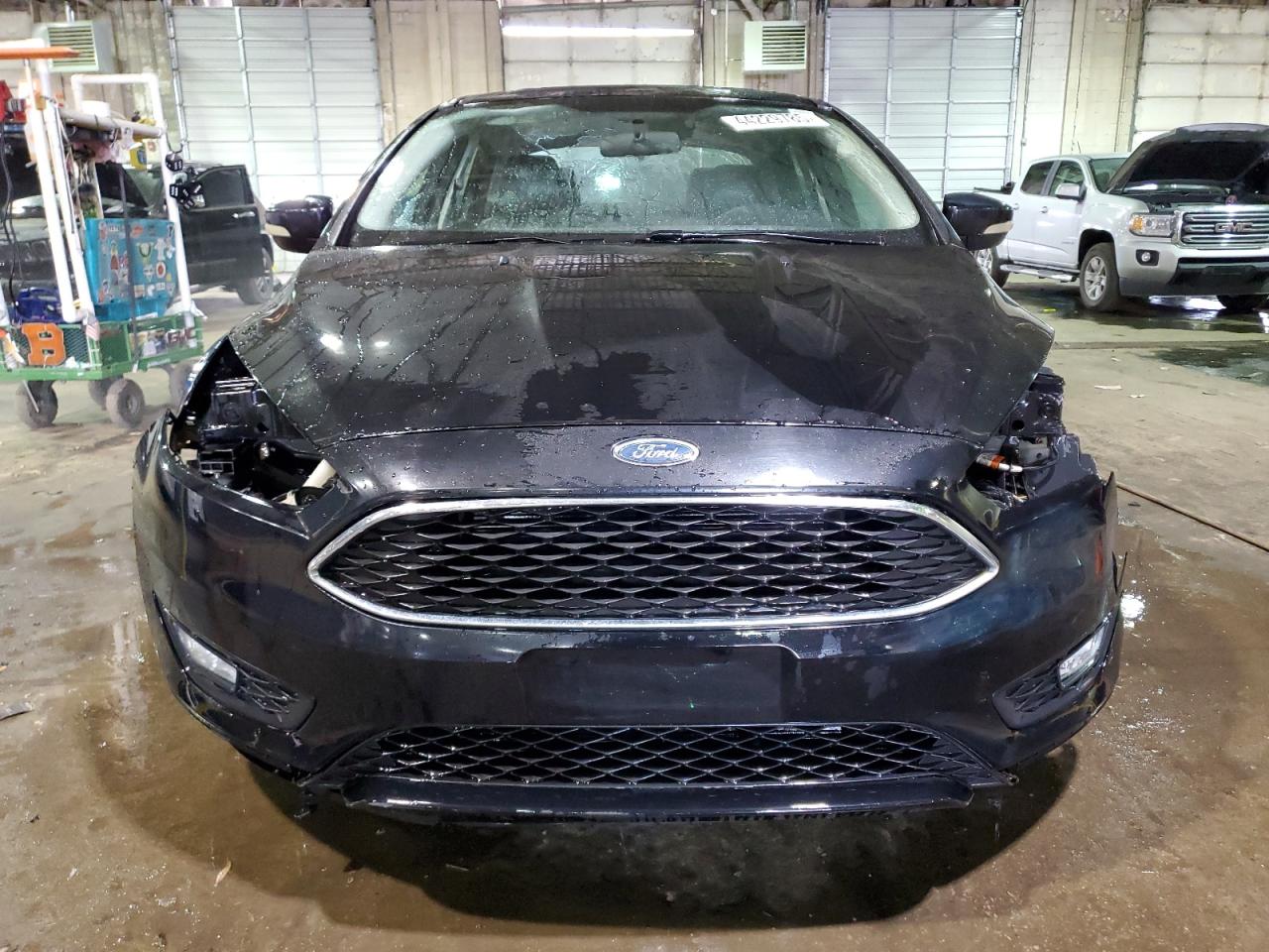 2016 Ford Focus VIN 1FADP3F21GL262339 Copart auction photo, front end / side damage thumbnail 5