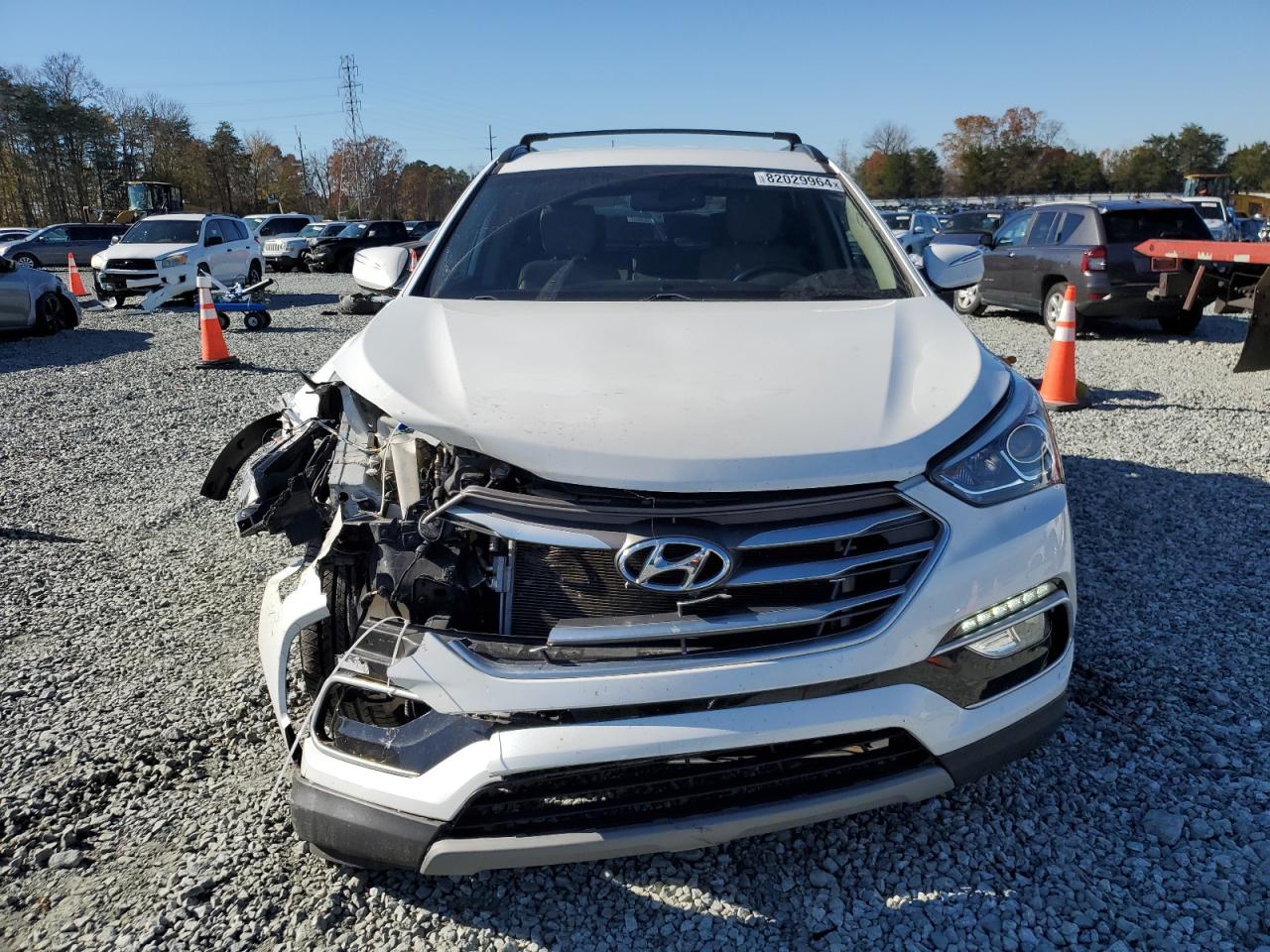 2018 Hyundai Santa Fe VIN 5NMZUDLB8JH104981 Copart auction photo, front end damage thumbnail 5