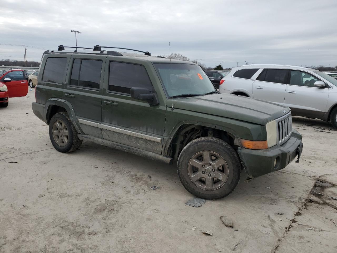 2007 Jeep Commander VIN 1J8HG58P07C550605 Copart auction photo, front end / hail damage thumbnail 4