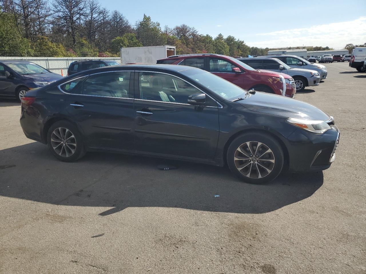2016 Toyota Avalon VIN 4T1BK1EB5GU232272 Copart auction photo, minor dent/scratches damage thumbnail 4