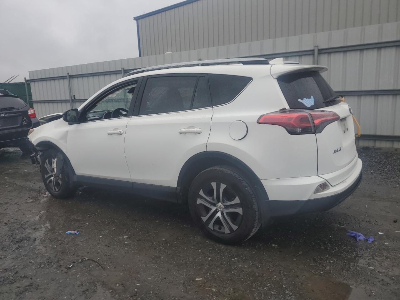 2017 Toyota RAV 4 VIN JTMBFREV4HJ161652 Copart auction photo, front end / minor dent/scratches damage thumbnail 2