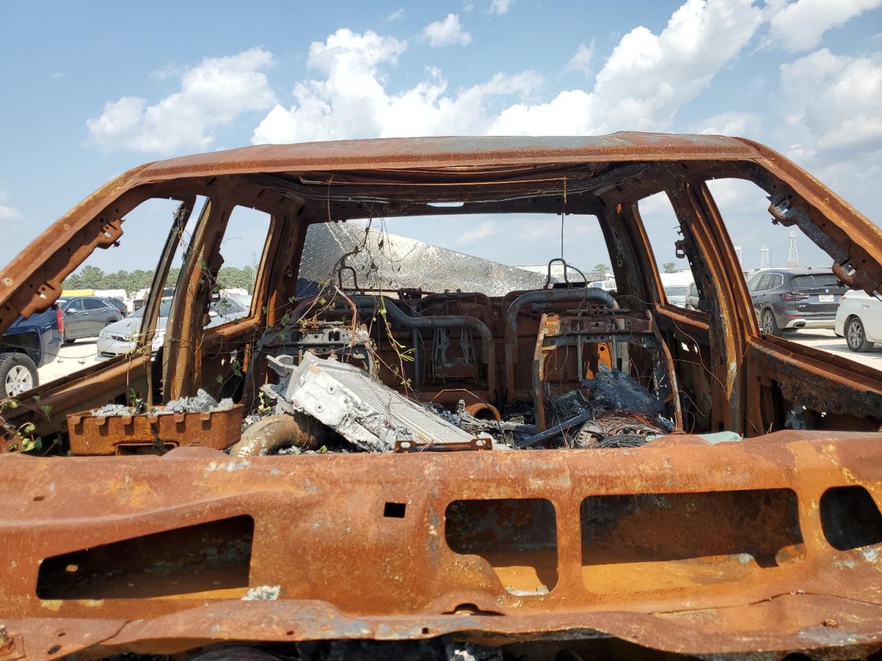 2021 RAM 3500 VIN 3C63R3JL3MG589972 Copart auction photo, burn - engine damage thumbnail 10