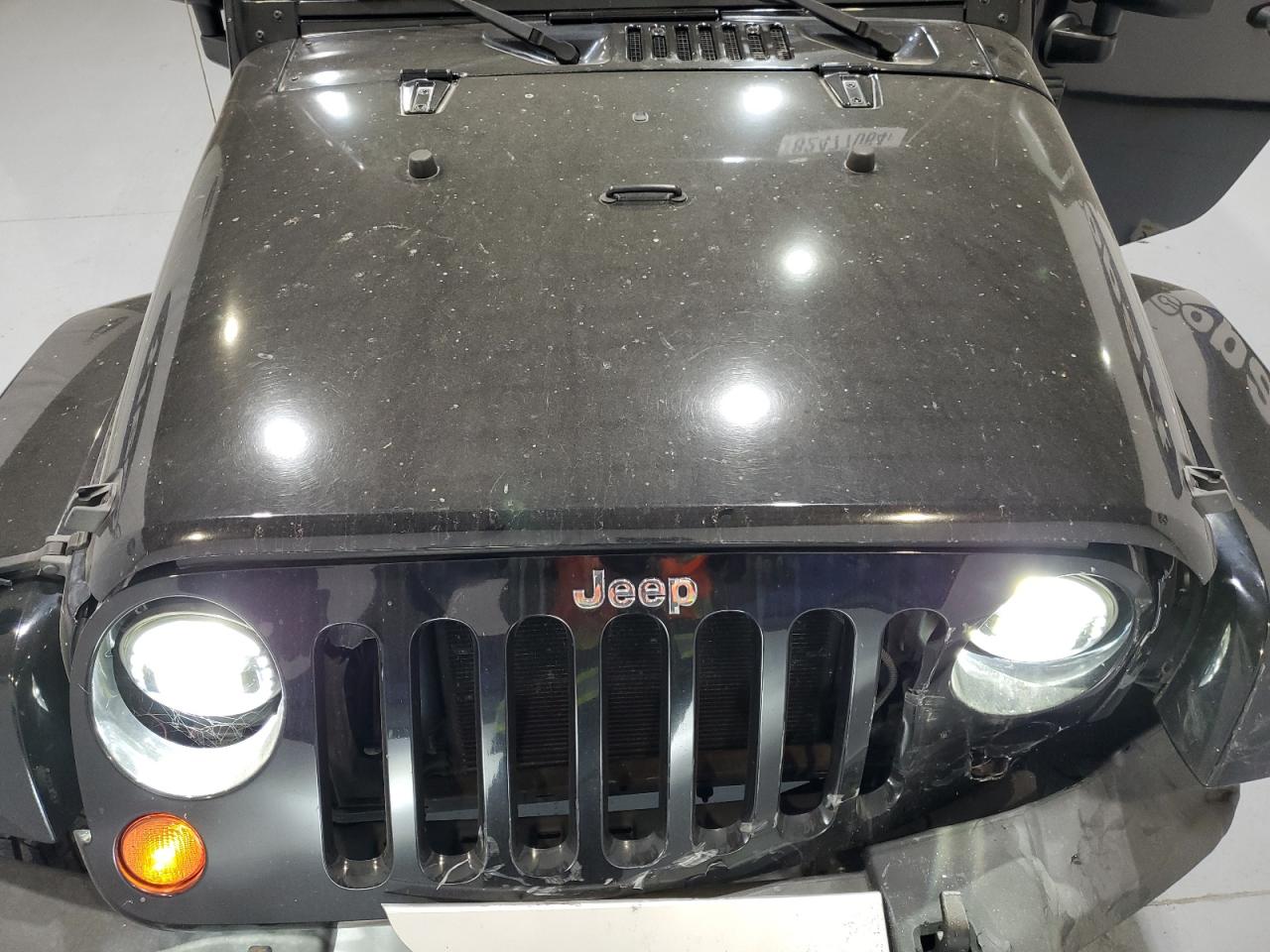 2010 Jeep Wrangler VIN 1J4HA5H11AL223894 Copart auction photo, front end damage thumbnail 12