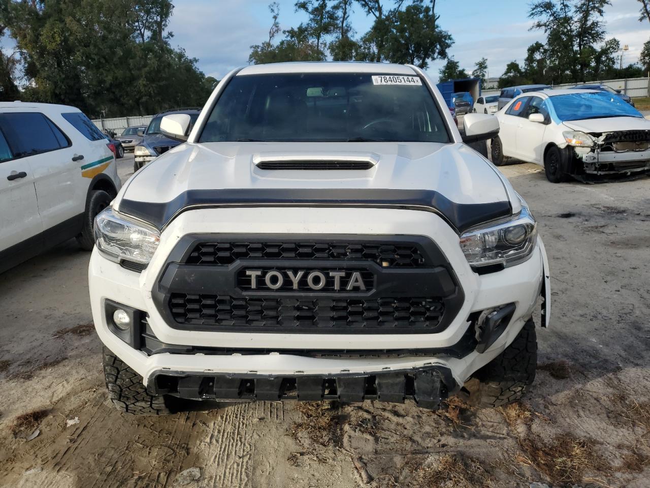2017 Toyota Tacoma VIN 5TFAZ5CN7HX045938 Copart auction photo, front end damage thumbnail 5