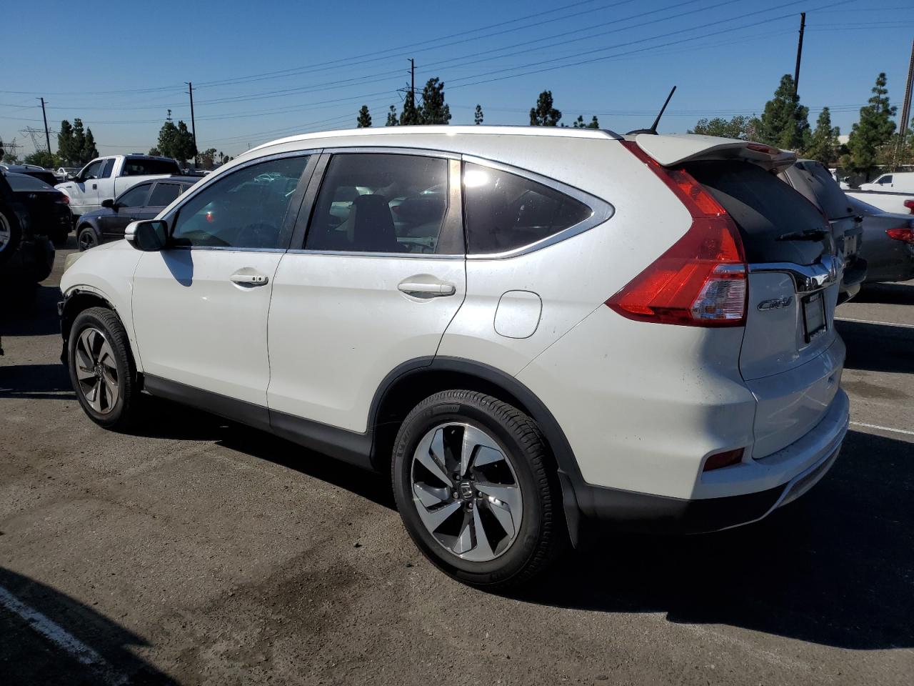 2015 Honda CR-V VIN 5J6RM4H94FL060676 Copart auction photo, all over / undercarriage damage thumbnail 2