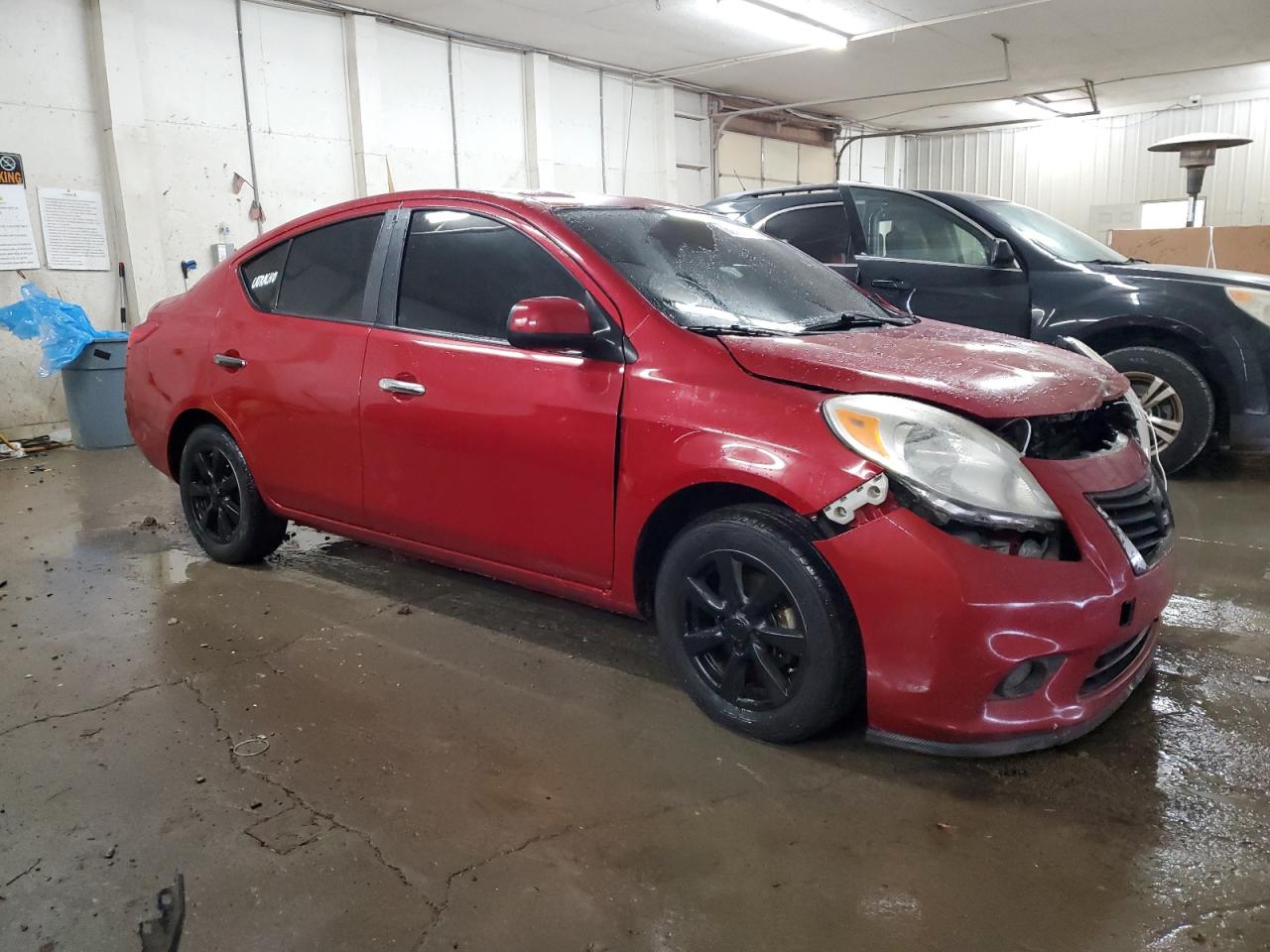 2012 Nissan Versa VIN 3N1CN7AP3CL817508 Copart auction photo, front end / hail damage thumbnail 4