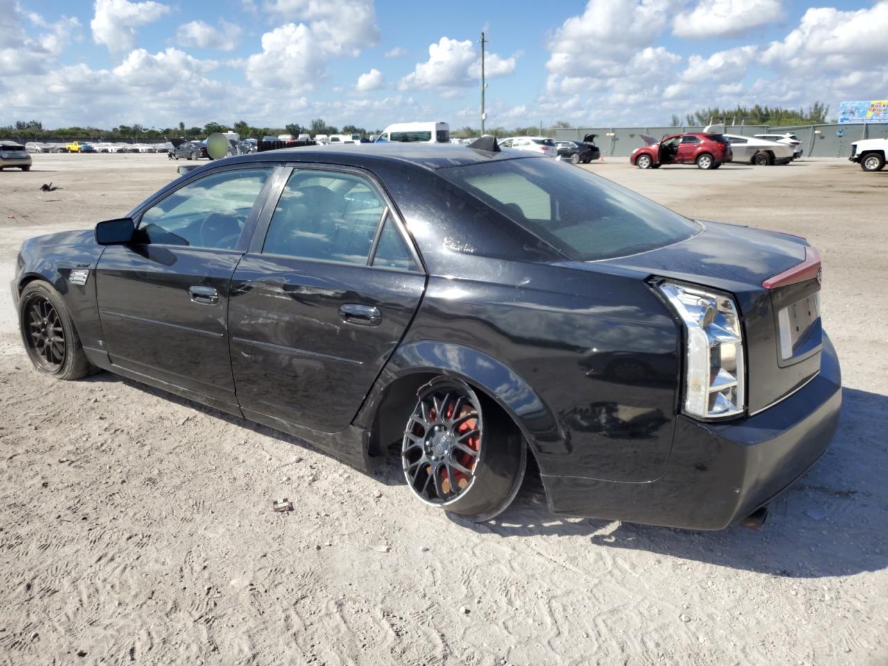2006 Cadillac CTS VIN 1G6DP577360159569 Copart auction photo, side damage thumbnail 2