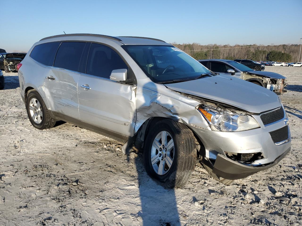 2010 Chevrolet Traverse VIN 1GNLRFEDXAS141544 Copart auction photo, front end / side damage thumbnail 4
