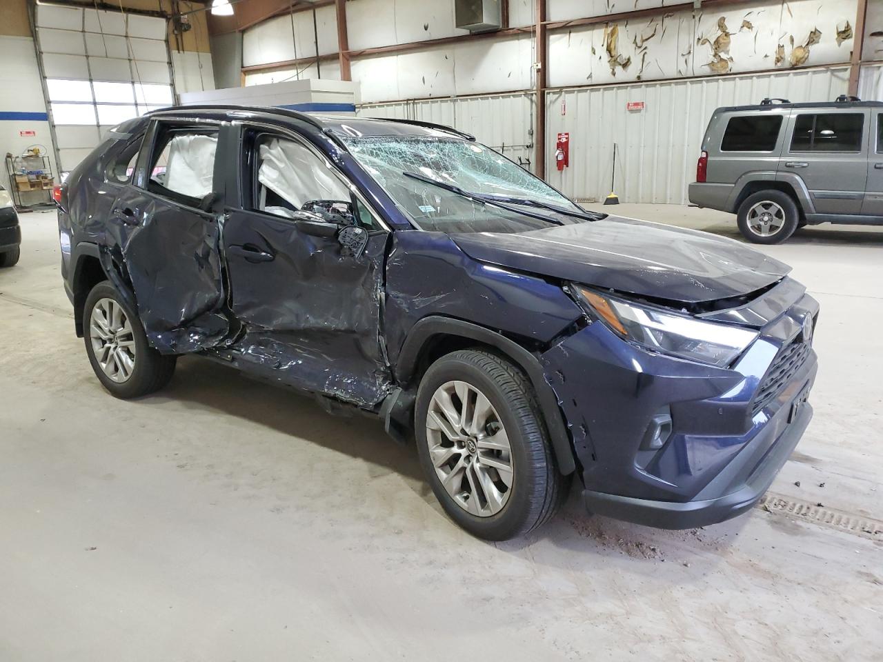 2023 Toyota RAV 4 VIN 2T3A1RFV6PW395946 Copart auction photo, rollover / undercarriage damage thumbnail 4
