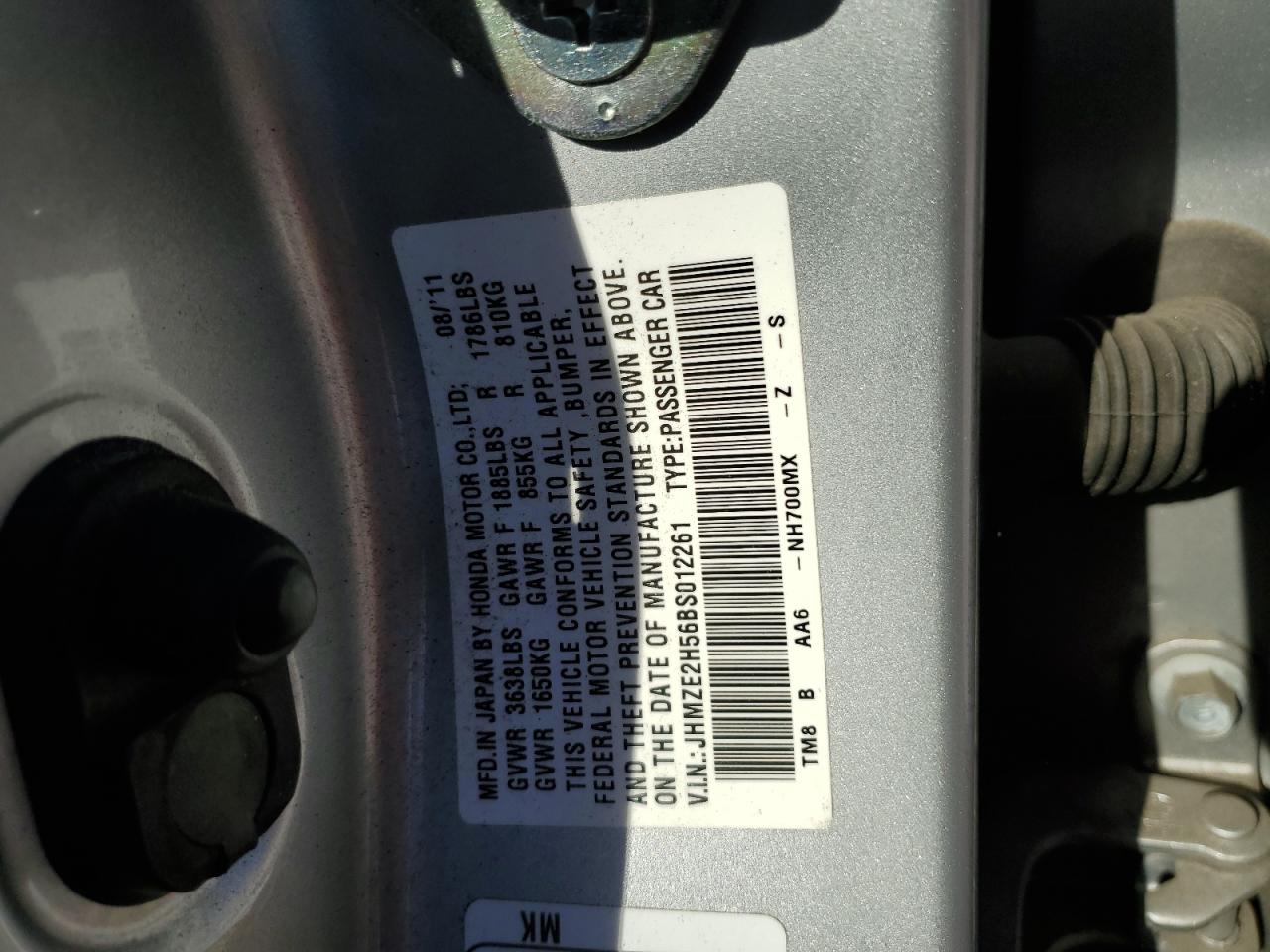 2011 Honda Insight VIN JHMZE2H56BS012261 Copart auction photo, undercarriage / minor dent/scratches damage thumbnail 12