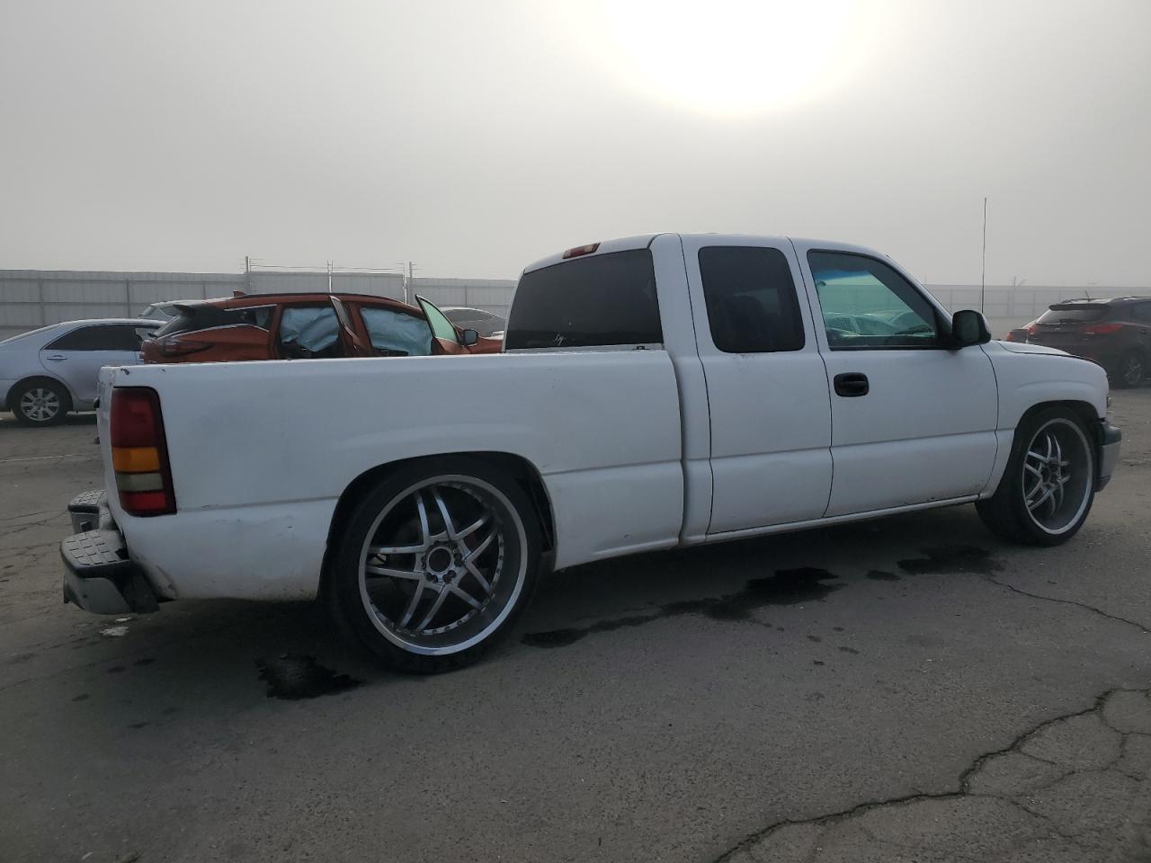 2001 Chevrolet Silverado VIN 1GCEC19T11Z185883 Copart auction photo, side / rear end damage thumbnail 3